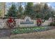 Durham Lakes Golf and Country Club entrance sign adorned with festive holiday decor at 75 Glen Abbey Cir, Fairburn, GA 30213