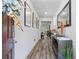 Elegant foyer with hardwood floors, stylish console table, and decorative mirrors for a welcoming entrance at 75 Glen Abbey Cir, Fairburn, GA 30213
