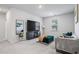 Bright living area with plush carpeting, contemporary decor, and ample space for relaxing and entertaining at 75 Glen Abbey Cir, Fairburn, GA 30213