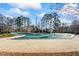 Community pool covered for the off-season, ready for summer fun and relaxation at 75 Glen Abbey Cir, Fairburn, GA 30213
