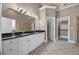 Bright bathroom features double sink vanity, granite countertops, and a separate walk-in closet at 774 Mary Ann Ne Dr, Marietta, GA 30068