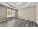 Comfortable bedroom with neutral walls, recessed lighting, and wood flooring at 774 Mary Ann Ne Dr, Marietta, GA 30068