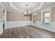 Dining room showcasing stylish chandelier and wainscoting at 774 Mary Ann Ne Dr, Marietta, GA 30068