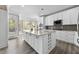 Modern kitchen features granite countertops and a large center island with storage at 774 Mary Ann Ne Dr, Marietta, GA 30068