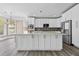Bright kitchen features stainless steel appliances, granite countertops, and ample cabinet space at 774 Mary Ann Ne Dr, Marietta, GA 30068