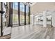 Open living room showcasing tall ceilings, fireplace, and seamless flow to the kitchen at 774 Mary Ann Ne Dr, Marietta, GA 30068