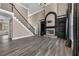 Spacious living room boasts a fireplace and easy access to the staircase at 774 Mary Ann Ne Dr, Marietta, GA 30068