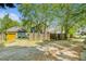 A spacious, gravel-filled backyard enclosed by wooden fencing and mature trees at 1065 Wylie Se St, Atlanta, GA 30316