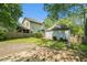 Spacious backyard featuring a detached garage, a small deck, and a well-maintained lawn at 1065 Wylie Se St, Atlanta, GA 30316