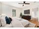 Comfortable bedroom with hardwood floors, natural light, and a ceiling fan at 1065 Wylie Se St, Atlanta, GA 30316