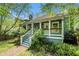 Charming home with a welcoming front porch and well-maintained landscaping at 1065 Wylie Se St, Atlanta, GA 30316
