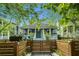 Charming home with a covered front porch and manicured landscaping at 1065 Wylie Se St, Atlanta, GA 30316