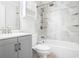 Clean bathroom with a tiled shower and built in shelving with storage space underneath the sink at 133 Cross Gate Dr, Marietta, GA 30068