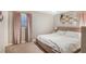 Comfortable bedroom with neutral carpet, blush pink accents, and ample natural light at 133 Cross Gate Dr, Marietta, GA 30068
