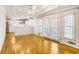 Open concept living space featuring hardwood floors, and a view into the kitchen at 133 Cross Gate Dr, Marietta, GA 30068