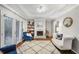 Bright living room features a fireplace, hardwood floors, trey ceilings, and natural light at 133 Cross Gate Dr, Marietta, GA 30068