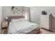 Comfortable main bedroom with decorative shelves, plush bed and plenty of storage at 133 Cross Gate Dr, Marietta, GA 30068