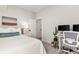 Well-lit bedroom with desk and neutral decor at 228 Idylwilde Way, Canton, GA 30115