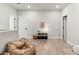 Neutral bonus room with hardwood flooring and decorative wall art at 228 Idylwilde Way, Canton, GA 30115