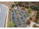 A community garden contains raised planting beds filled with soil and ready for planting in a manicured space at 228 Idylwilde Way, Canton, GA 30115