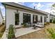 Back patio with fire pit and comfortable seating at 228 Idylwilde Way, Canton, GA 30115