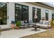 Back patio with fire pit and comfortable seating at 228 Idylwilde Way, Canton, GA 30115