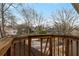 Balcony overlooking an established neighborhood with mature trees and unique rooflines at 873 Monroe Ne Cir, Atlanta, GA 30308