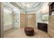 Elegant bathroom with glass shower, soaking tub, granite counters, and hardwood style floors at 225 Cotton Field Ct, Alpharetta, GA 30022