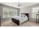 Well-lit bedroom with large windows and neutral decor at 225 Cotton Field Ct, Alpharetta, GA 30022