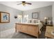 Cozy bedroom with soft carpet, a wood-frame bed, and two windows providing natural light at 225 Cotton Field Ct, Alpharetta, GA 30022