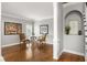 Inviting living room with hardwood floors, decorative columns, and neutral paint creating an open, airy space at 225 Cotton Field Ct, Alpharetta, GA 30022
