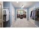 Spacious walk-in closet with ample storage, natural light and access to second closet at 225 Cotton Field Ct, Alpharetta, GA 30022