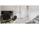 Bedroom featuring neutral walls, carpet, and desk area near closet at 2319 White Alder Dr, Buford, GA 30519