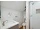 Well-lit bathroom with subway tiled shower and modern sink at 404 Princeton Ne Way, Atlanta, GA 30307