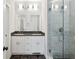 Modern bathroom with dual sinks, shower, and vanity at 404 Princeton Ne Way, Atlanta, GA 30307