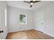 Bright bedroom with hardwood floors, ceiling fan, and ample natural light at 404 Princeton Ne Way, Atlanta, GA 30307
