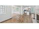 Bright open living space with hardwood floors, a modern kitchen, and large windows for natural light at 404 Princeton Ne Way, Atlanta, GA 30307