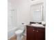 Functional bathroom with a shower-tub combo and a vanity with a dark countertop at 416 Blue Sky Cir, Acworth, GA 30102