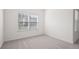 Well-lit bedroom with neutral walls, and carpeted floors at 416 Blue Sky Cir, Acworth, GA 30102