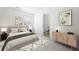 Comfortable bedroom showcasing neutral decor and an ensuite bathroom at 416 Blue Sky Cir, Acworth, GA 30102