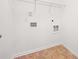 Bright laundry room featuring hookups, storage, and neutral wall color at 416 Blue Sky Cir, Acworth, GA 30102
