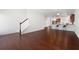 Open floor plan showcasing hardwood floors, stairs, and an adjacent kitchen area at 416 Blue Sky Cir, Acworth, GA 30102