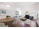 Bright living room featuring a fireplace, hardwood floors, and stylish furniture at 416 Blue Sky Cir, Acworth, GA 30102