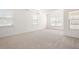 Spacious bedroom with natural light and neutral color palette and carpet at 416 Blue Sky Cir, Acworth, GA 30102