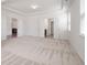 Spacious bedroom with multiple entries, ceiling detail, and neutral colored carpet at 416 Blue Sky Cir, Acworth, GA 30102