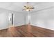 Bright and airy bedroom with hardwood floors and access to an en-suite bathroom at 9283 Whaleys Lake Ln, Jonesboro, GA 30238