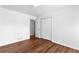 Bedroom with hardwood floors and a closet at 9283 Whaleys Lake Ln, Jonesboro, GA 30238