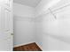 Walk-in Closet with wood floor and wire shelving at 9283 Whaleys Lake Ln, Jonesboro, GA 30238