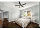 Cozy bedroom with dark wood floors, ample natural light, and neutral décor for a relaxing ambiance at 1450 Oglethorpe Sw Ave, Atlanta, GA 30310