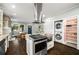 Bright kitchen with stainless appliances, granite counters open to dining and living rooms plus washer and dryer at 1450 Oglethorpe Sw Ave, Atlanta, GA 30310